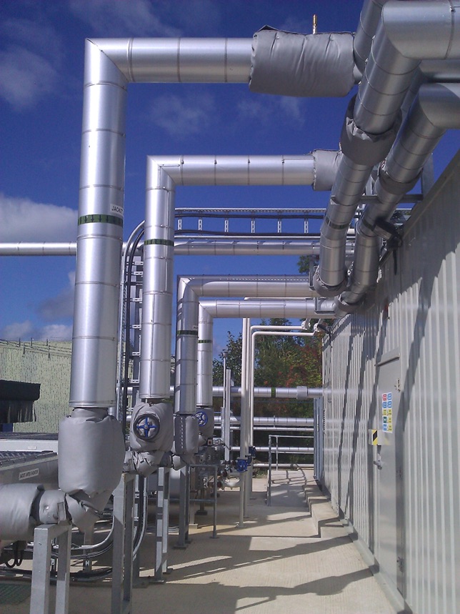 Various metal pipes outside a building